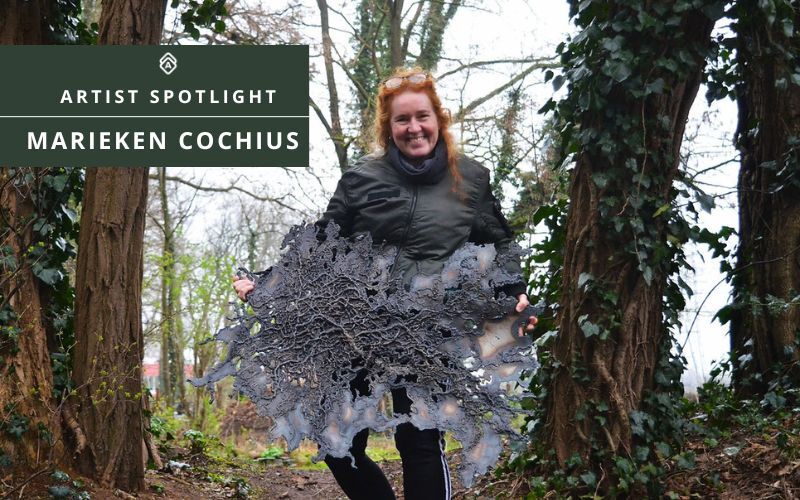 Artist Marieken Cochius with one of her welded drawings